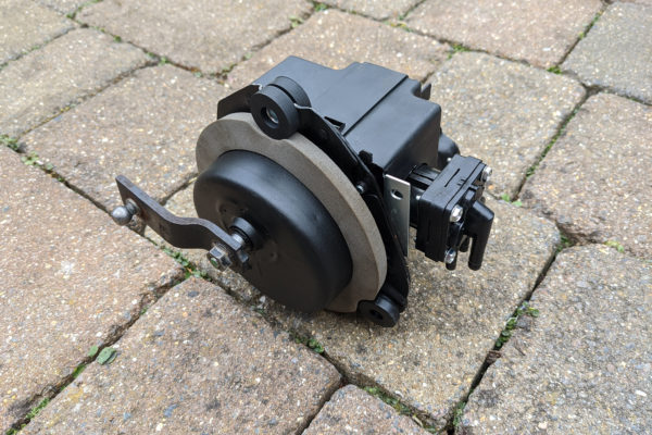 The back of the wiper motor with new seal and reusing the old connector link